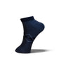 A single dark navy blue ankle sock with a subtle geometric pattern on the instep, shown on a clean white background with a soft shadow.
