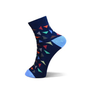 A single navy blue ankle sock with a colorful geometric pattern of small triangles and light blue toe and cuff accents, shown on a white background.